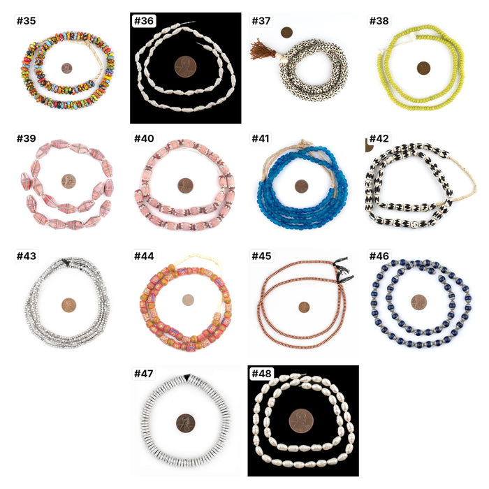 The real strands numbered 35-48, each photographed with a penny for scale: Studio Collection bead sets