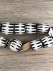 Hidden Gems: Cylindrical Kenya Batik Bone Beads (1 Broken Bead)