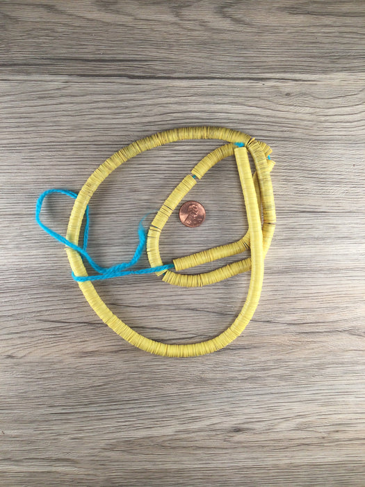 Hidden Gems: Yellow Vinyl Heishi Beads (May Need Cleaning)