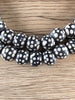 Hidden Gems: Black Polka Dot Java Skunk Beads