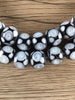 Hidden Gems: Black & White Java Glass Skunk Beads