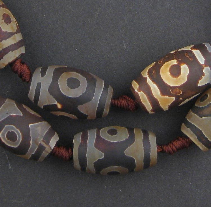 Dark Oval-Shaped Tibetan Agate Beads (23x15mm) - The Bead Chest