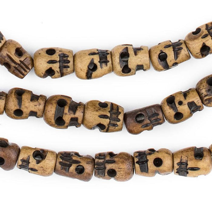 Brown Carved Bone Skull Mala Beads (12x8mm) - The Bead Chest