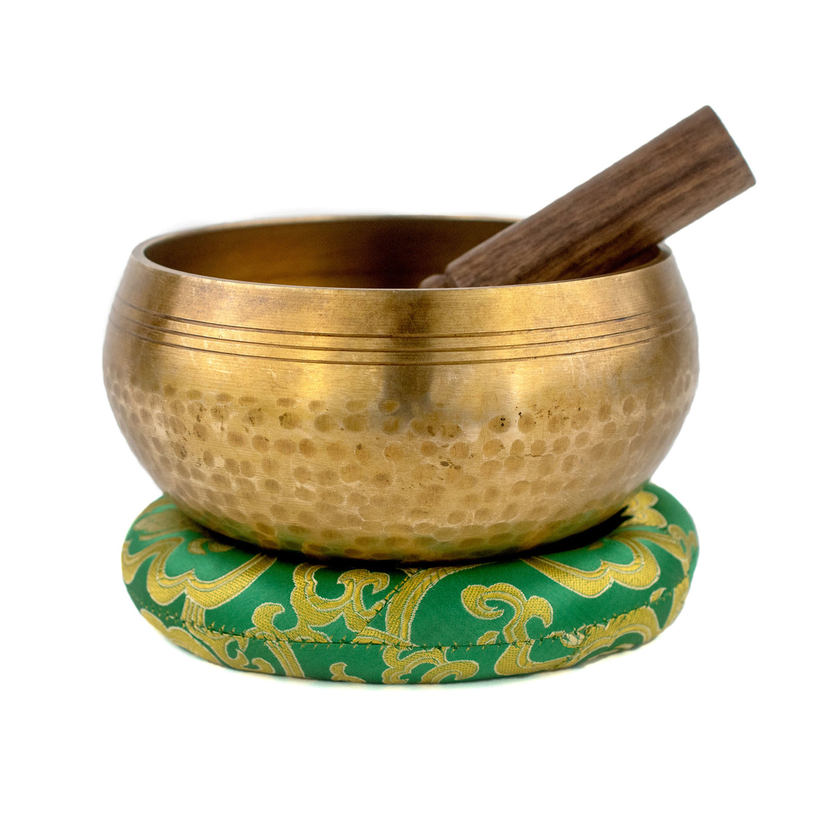 Tibetan Meditation Singing Bowl and wooden mallet with white background Stock Photo